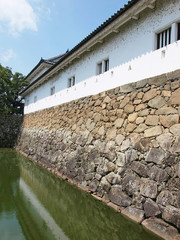 Fototapeta na wymiar moat and wall of Japanese Castle