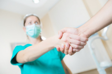 Handshake at the dentist office