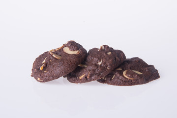 Almonds chocolate chips cookies on background