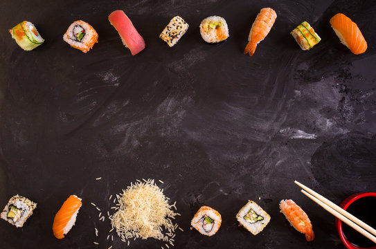 Sushi set on dark background. Minimalism