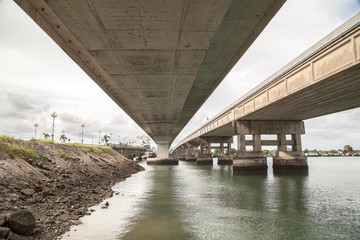 Under the bridge.