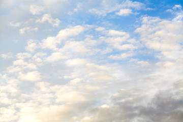 Blue sky with clouds and sun. Background