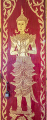 The religion art of Thai drawing on wooden door in Thailand temple