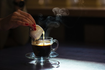 coffee with cream on table