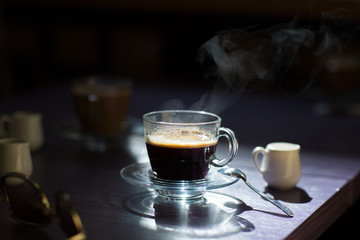 cup of hot coffee on the table