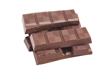 Broken milk chocolate bar isolated on white background