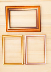 Classic wooden frame on wood background