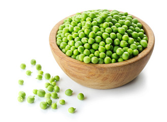 Fresh green peas in bowl isolated on white