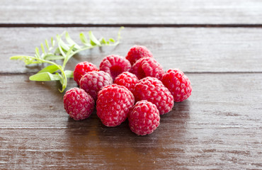 Fresh raspberries on a wooden table