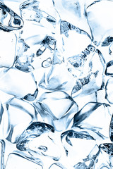 background of blue ice cubes, top view