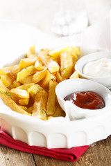 Fried potatoes with sauces