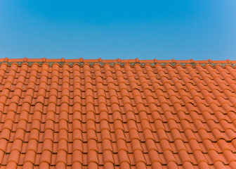 roof tile pattern over blue sky