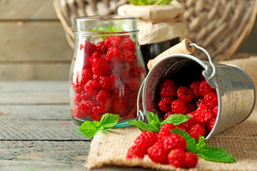 Sweet raspberries on wooden  background