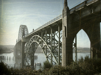 aged and worn vintage photo of bridge in taquina bay