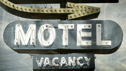 aged and worn vintage motel sign