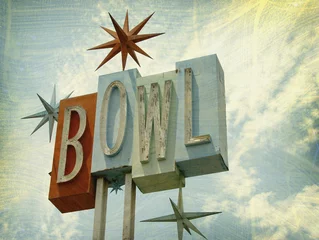 Fotobehang aged and worn vintage photo of bowling alley sign © jdoms