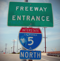 aged and worn vintage california freeway sign