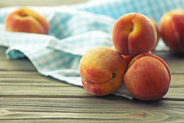 Sweet ripe peaches on table close up
