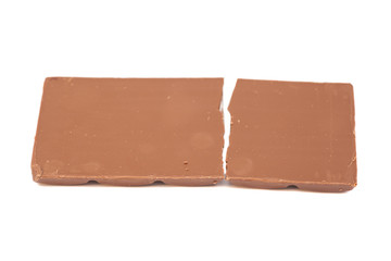 Broken chocolate bar on a white background