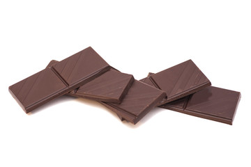 Broken chocolate on a white background