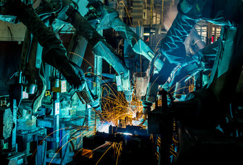 Welding Robot movement in a car factory