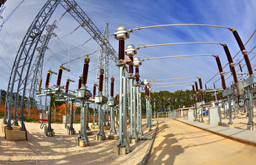 High voltage switchyard in electrical substation in fisheye perspective