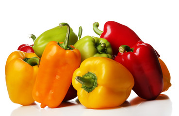 Group of colorful peppers isolated on white