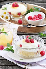 Raspberry trifle with mascarpone cream and lemon curd.Selective focus. 