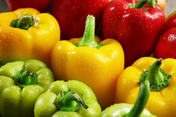 Group of wet colorful peppers, closeup