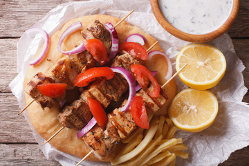 Greek souvlaki with pita close-up. horizontal view from above
