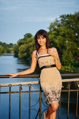 Portrait of a beautiful smiling woman in the park