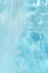 defocused blue flowing water background