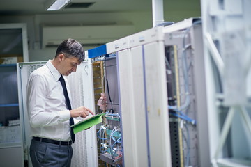 network engineer working in  server room