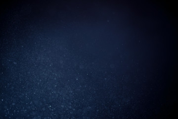 abstract dark bokeh lights background ,  defocused background, glowing galaxy