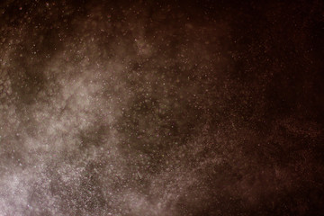 abstract dark bokeh lights background ,  defocused background, glowing galaxy