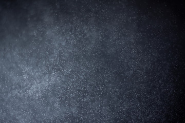 abstract dark bokeh lights background ,  defocused background, glowing galaxy