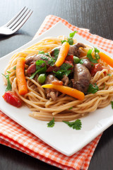 Fried chicken hearts , pasta and vegetables