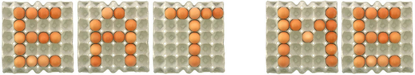EAT ME word from eggs in paper tray