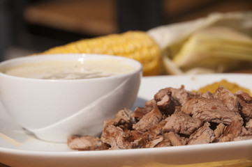 Rasted meat with corn sauce