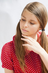 A close-up portrait of an attractive young girl 