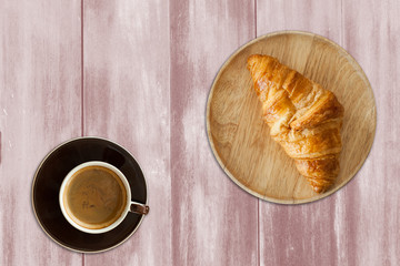 Coffee on old wood wall background.