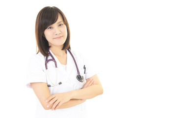 微笑む女医