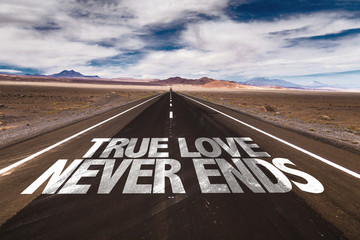 True Love Never Ends written on desert road