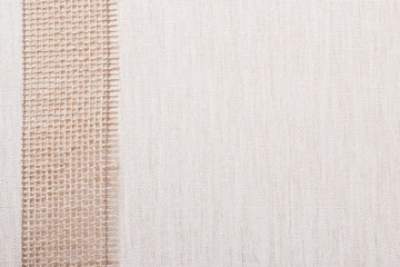 Jute ribbon on linen cloth background