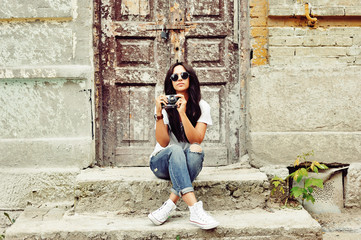 Beautiful and fashion young woman posing outdoor