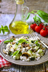 Rice with fried zucchini and mushroom.