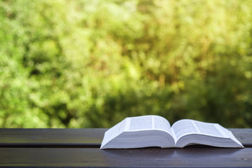 book on a wooden table