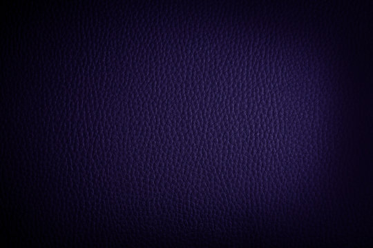 dark purple  leather background or texture with dark vignette bo