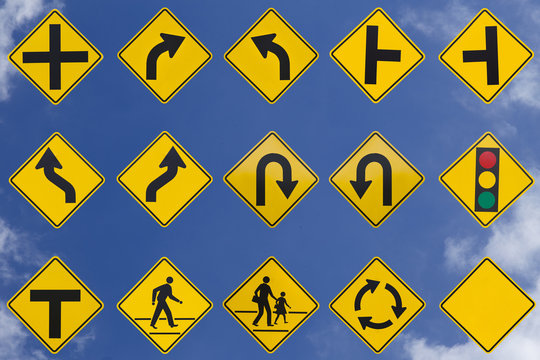 yellow road signs, traffic signs set on sky background