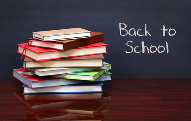 Pile of books on the desk